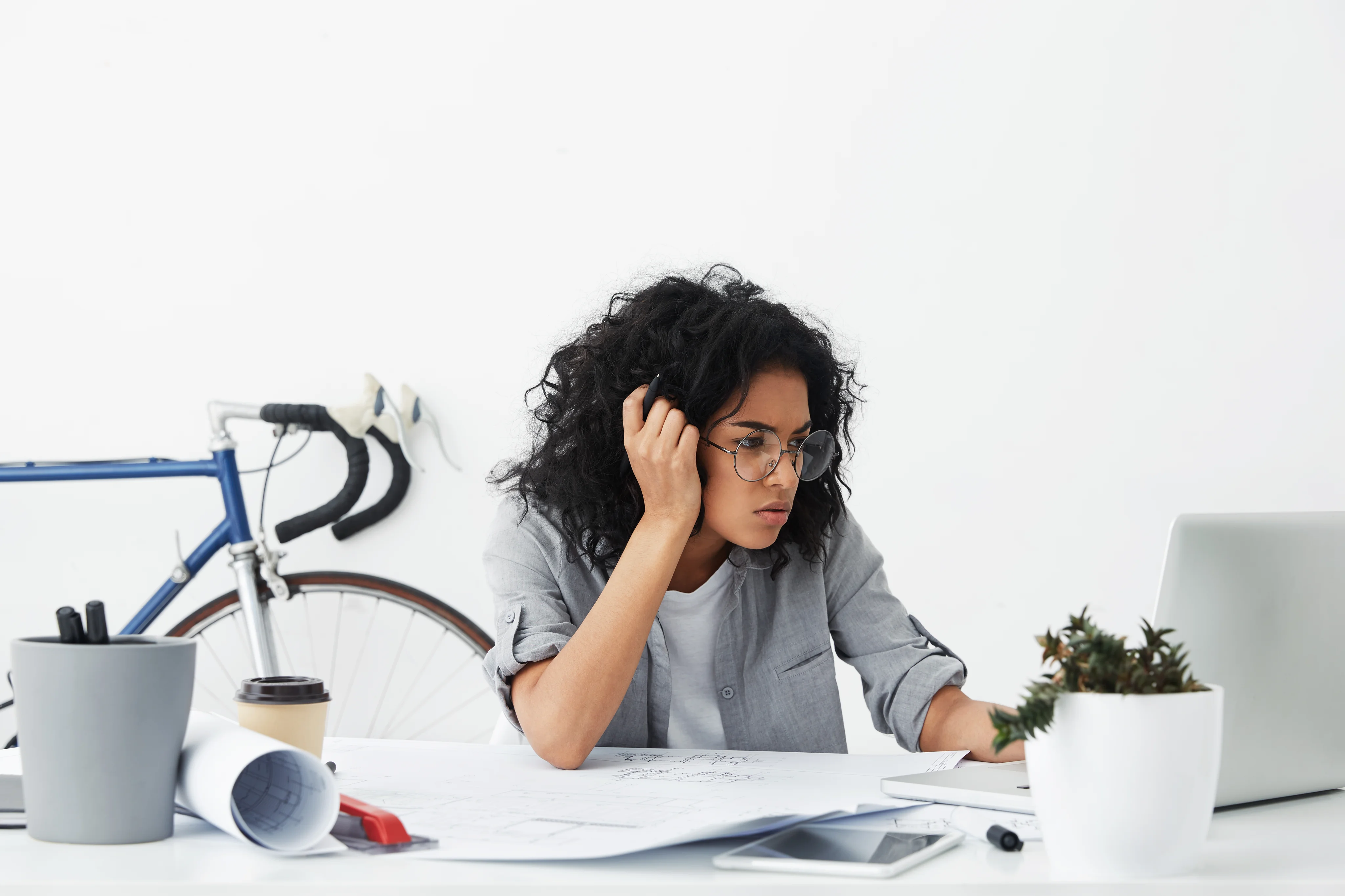 shot-tired-business-enterpreneur-dark-skinned-female-wearing-big-eyeglasses.jpg