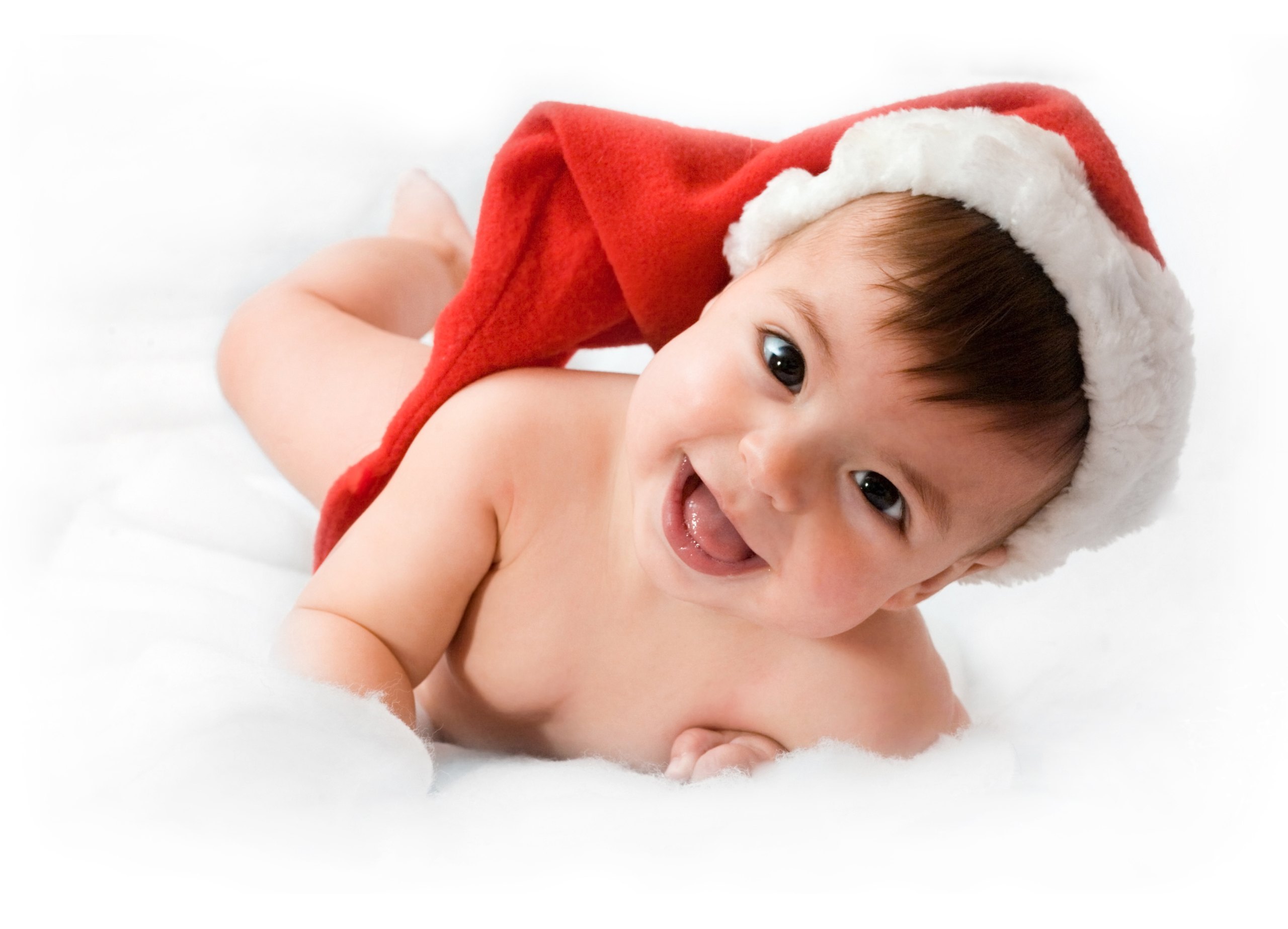 smiling baby in Santa hat